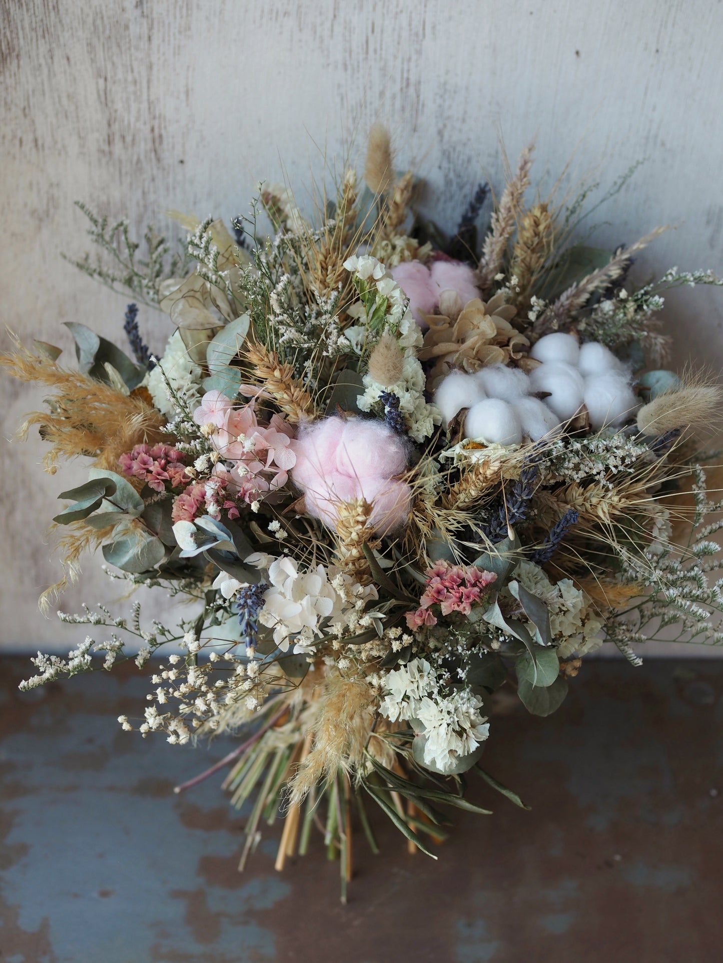 Little Bo Pink is a charming dried and preserved arrangement in soft pinks and gentle neutrals, featuring fluffy cotton for a delicate, tender touch. Perfect for welcoming a new little bundle, celebrating a gender reveal, or adding a sweet accent to any special occasion.
Approximately 23 cm in diameter