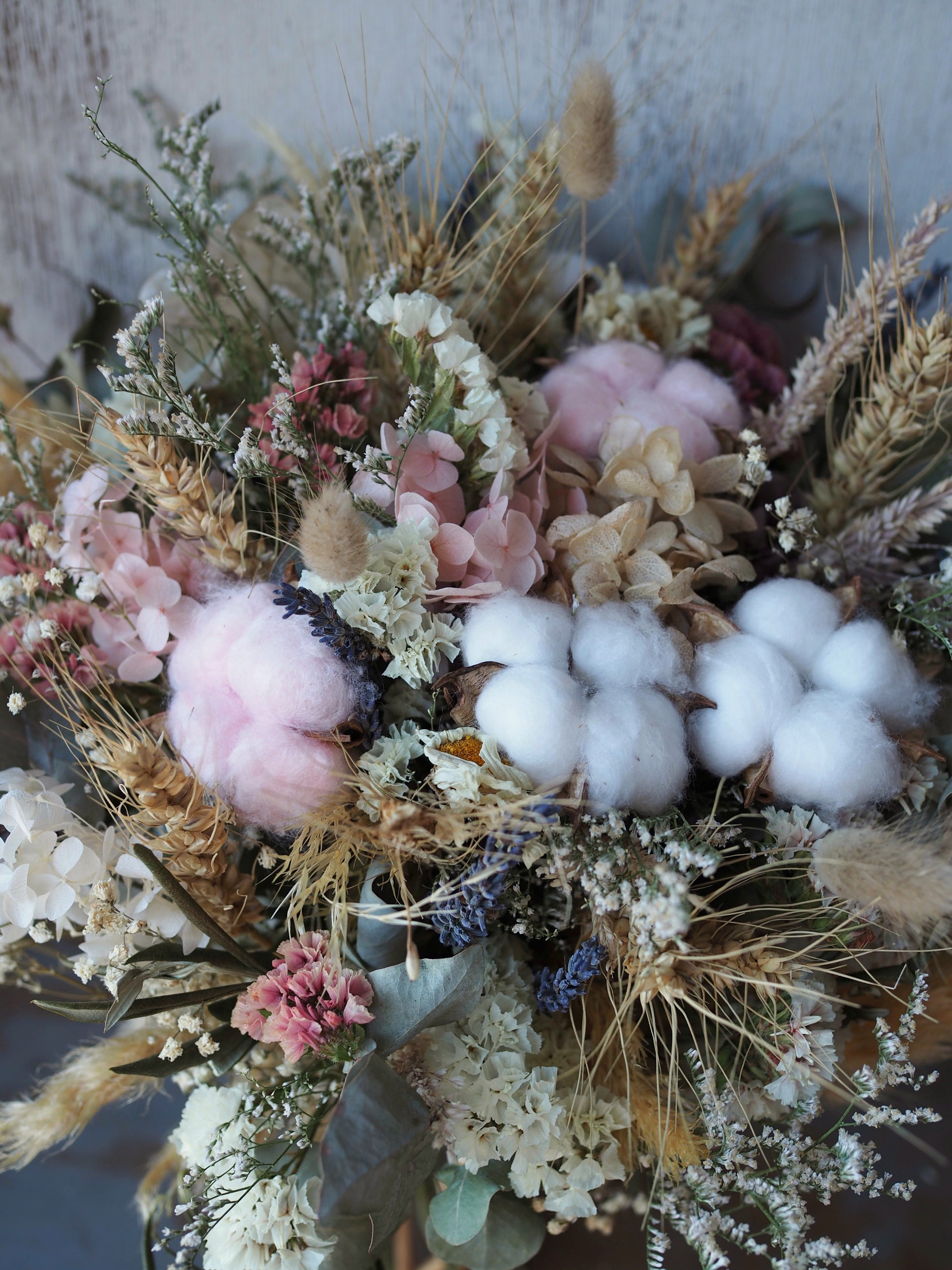 Little Bo Pink is a charming dried and preserved arrangement in soft pinks and gentle neutrals, featuring fluffy cotton for a delicate, tender touch. Perfect for welcoming a new little bundle, celebrating a gender reveal, or adding a sweet accent to any special occasion.&nbsp;

Approximately 23 cm in diameter